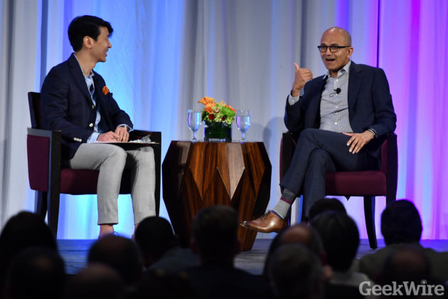 Microsoft CEO Satya Nadella, right, with GeekWire chairman and PicMonkey CEO Jonathan Sposato at the Tech Alliance luncheon on Monday, May 2, 2016.
