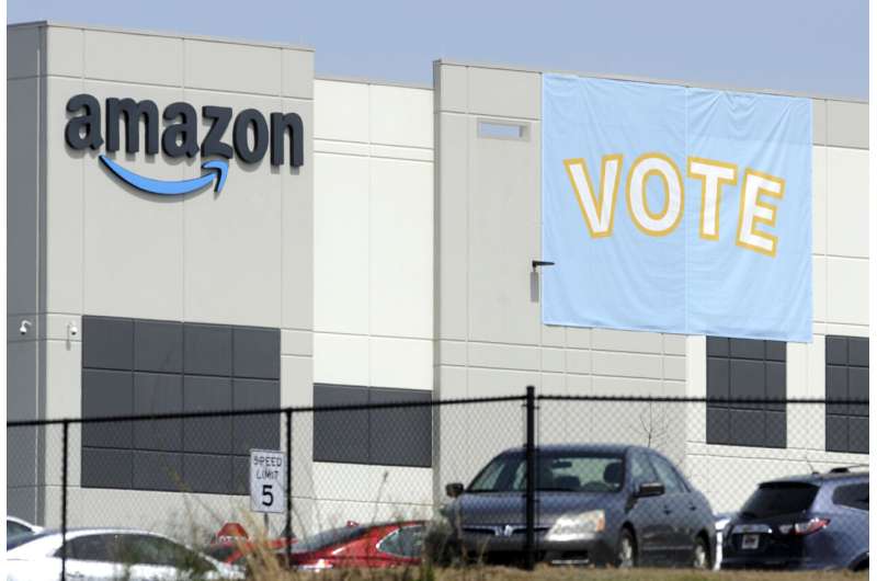 Amazon tries to stave off union drive on two fronts