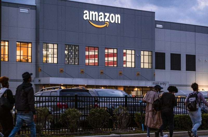Amazon tries to stave off union drive on two fronts