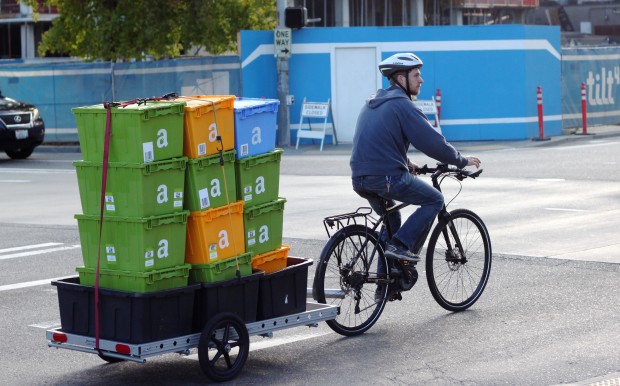 An Amazon bicycle courier in Seattle. (GeekWire Photo, Jacob Demmitt.)